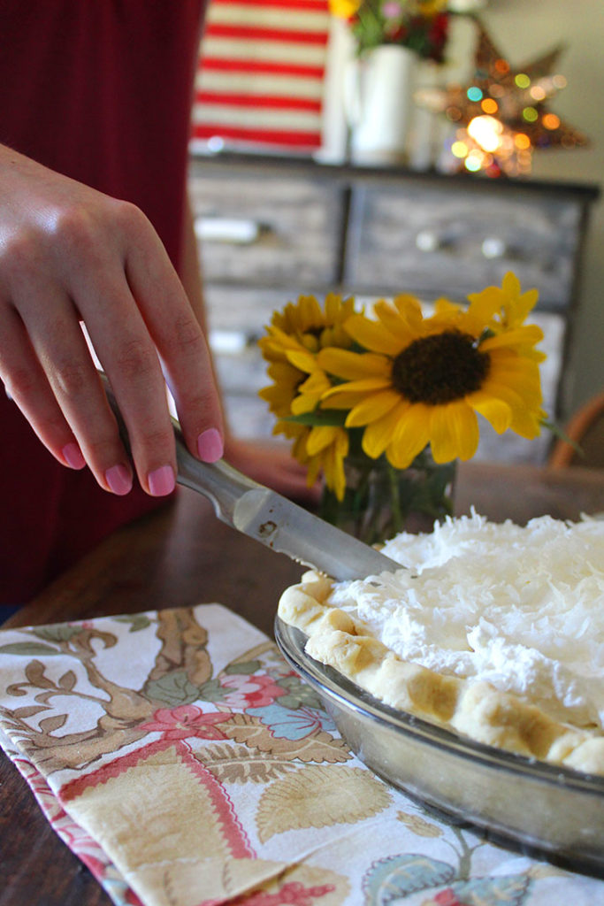 Cutting coconut cream pie
